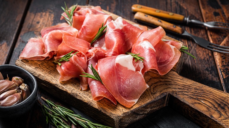 prosciutto on cutting board