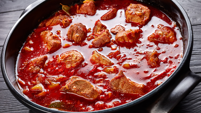 Pork chile red sauce cast iron