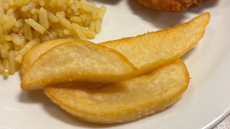 Golden Corral seasoned wedge fries on plate