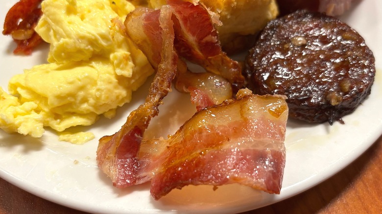 Golden Corral bacon on white plate