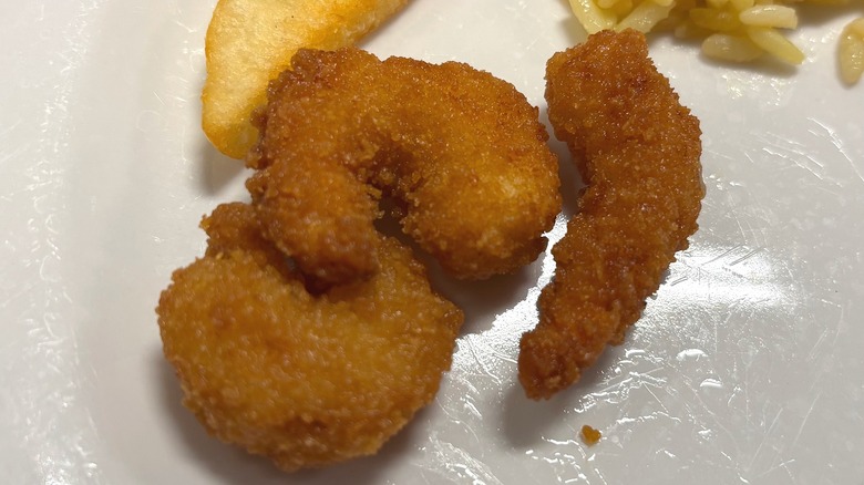 Golden Corral fried shrimp on white plate