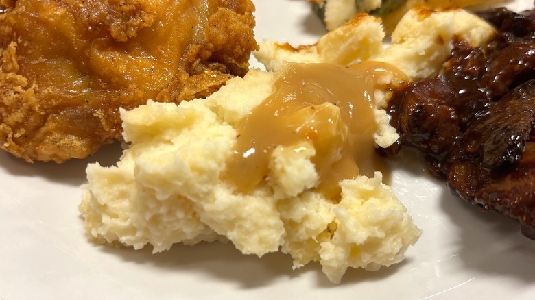 Golden Corral mashed potatoes and gravy on white plate