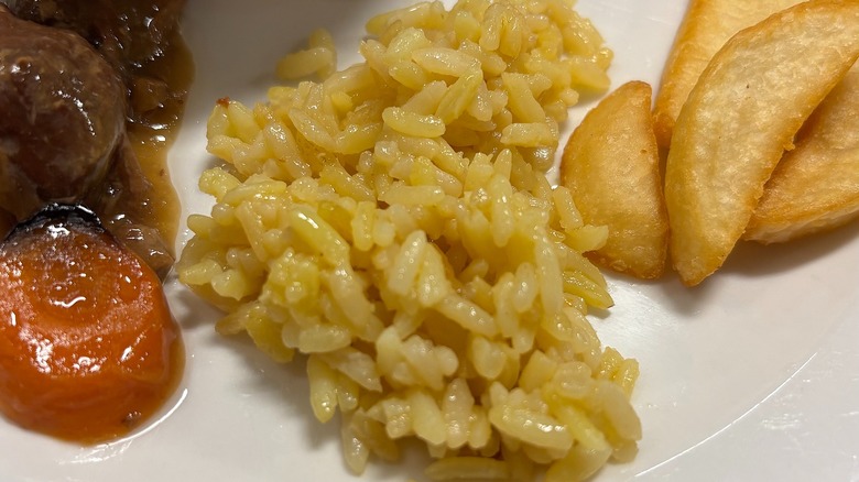 Golden Corral yellow rice on white plate