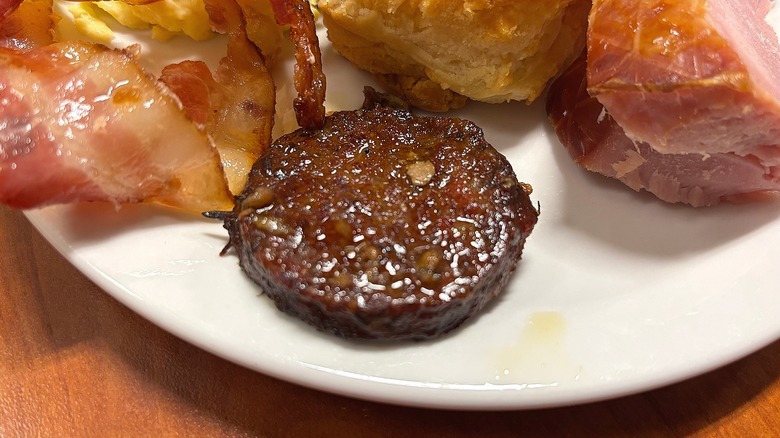 Golden Corral sausage patty on white plate