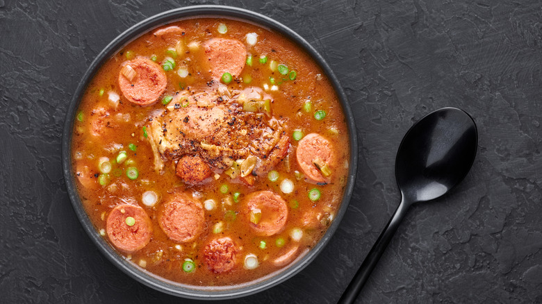 Sausage gumbo with spoon