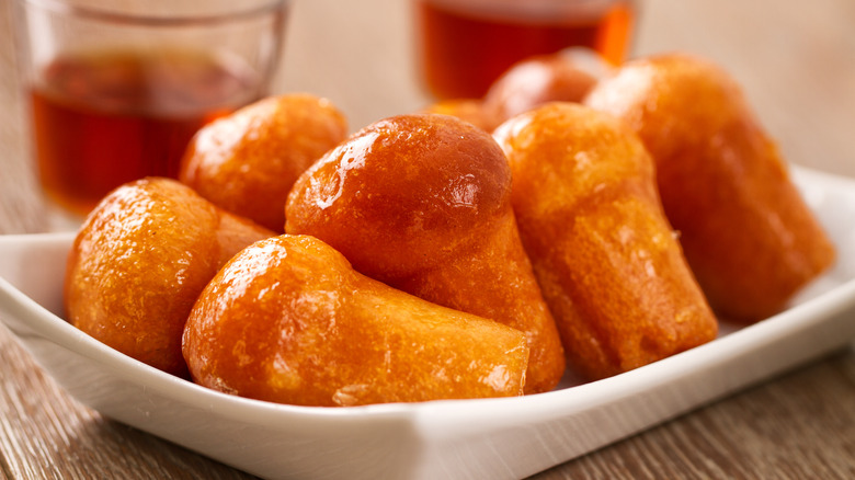 Rum babà on a white dish