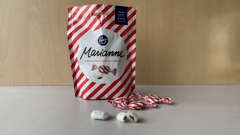 white and red striped bag with candy