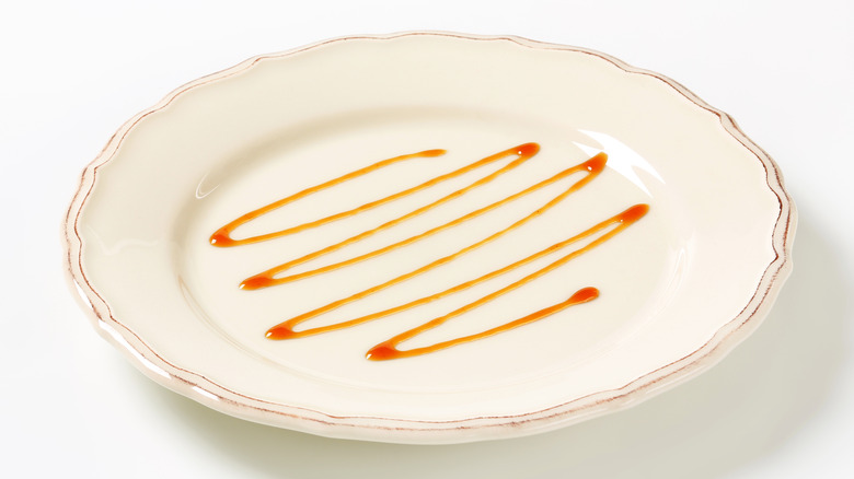 Caramel drizzle on plate