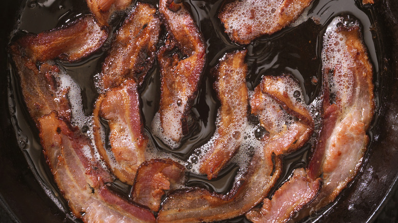 Bacon cooking in pan 