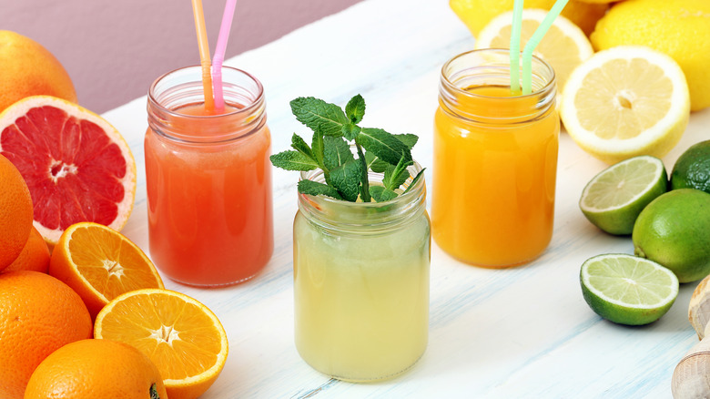 mason jars holding citrus juices