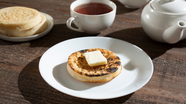 crumpet with butter and tea