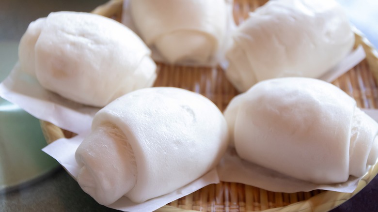 chinese steamed buns in basket