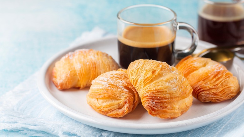 italian sfogliatelle with coffee mug