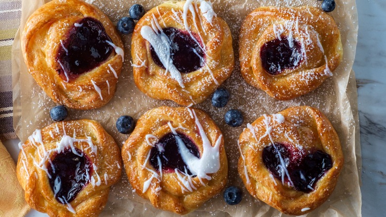 blueberry wienerbrod danishes on parchment paper