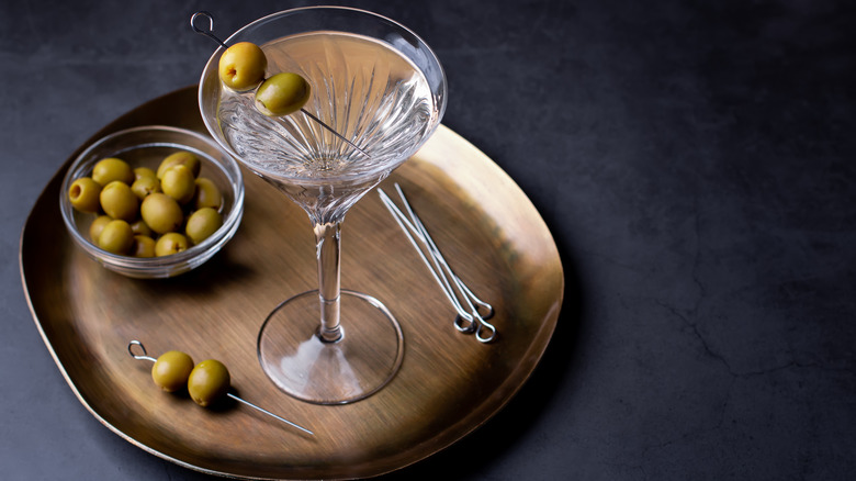 martini on tray with olives