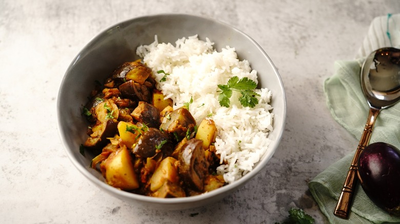 Aloo baingan and rice bowl