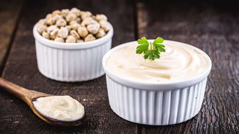 Aquafaba and cream on table