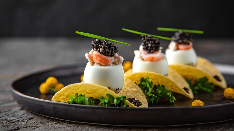 Potato chip appetizer with caviar
