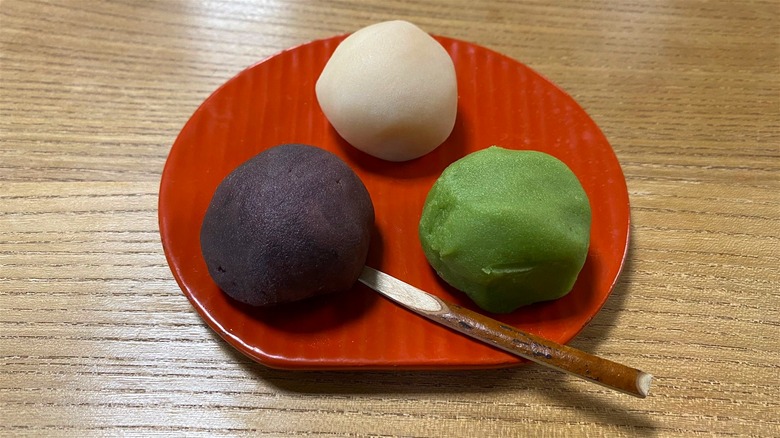 Uguisu dango on red plate