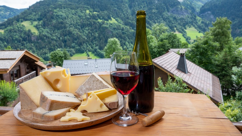 Wine and cheese with mountains