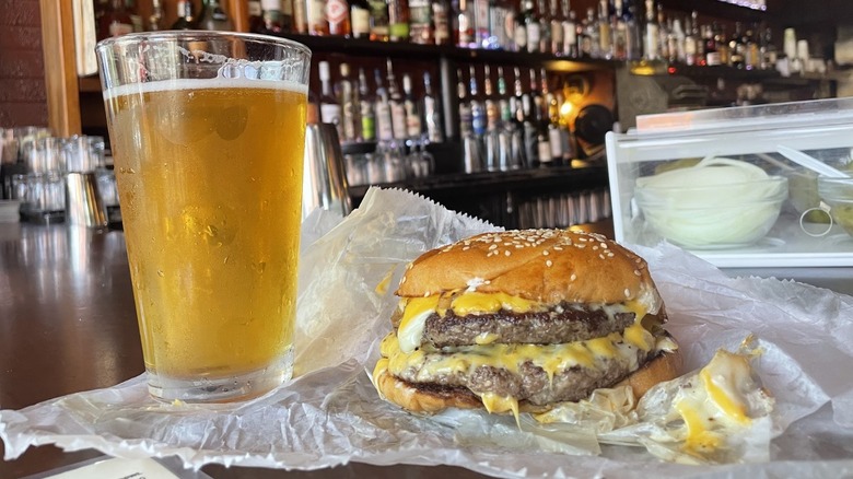 Juicy double cheeseburger and beer