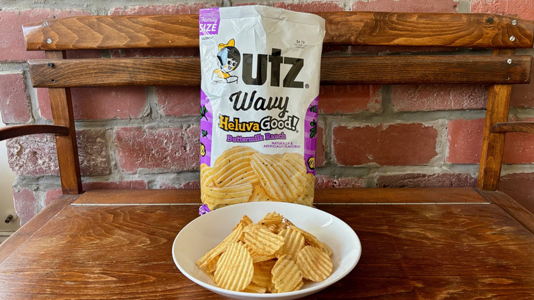 Bowl of chips in front of open bag Utz Wavy Heluva Good! Buttermilk Ranch chips