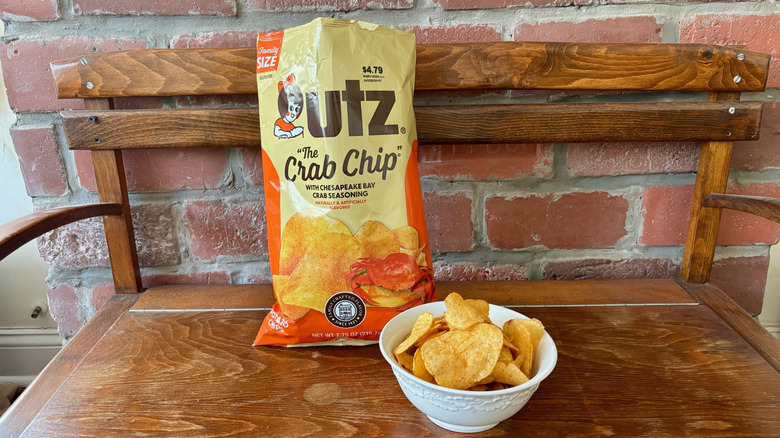 Bowl of The Crab Chip next to open bag