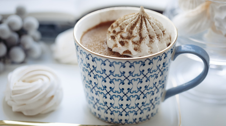 Hot chocolate in mug with dollop cream