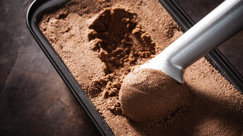 homemade ice cream in a pan with a scoop