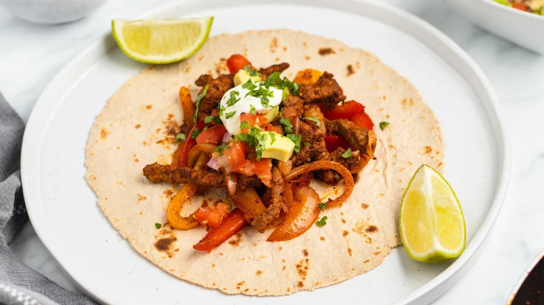 steak fajitas on flour torilla