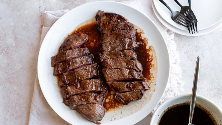 steak resting in marinade