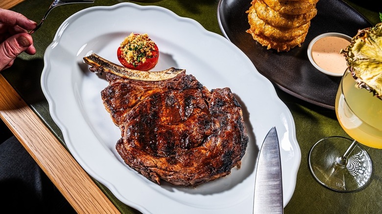 bone-in ribeye and onion rings