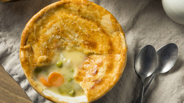 Chicken pot pie on grey linen