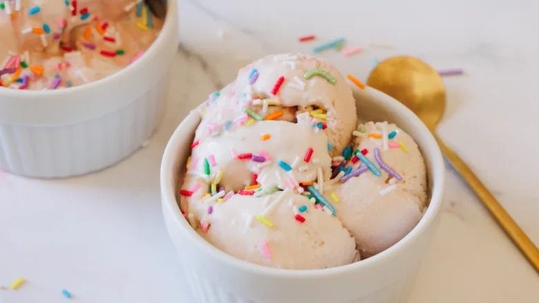 A bowl of birthday cake batter ice cream