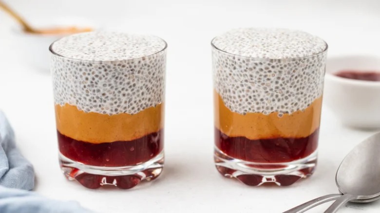 Two glass cups of PB&J chia seed pudding