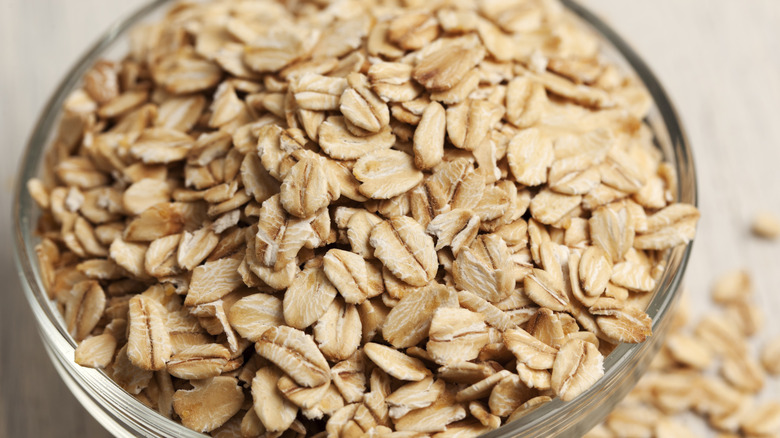 Dry oats in glass bowl