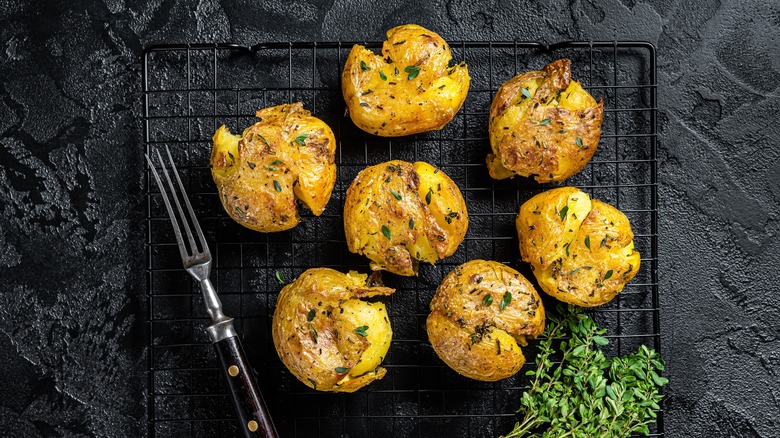 Crispy smashed potatoes on wire rack