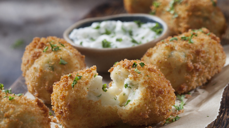 Mashed potato croquettes with sauce