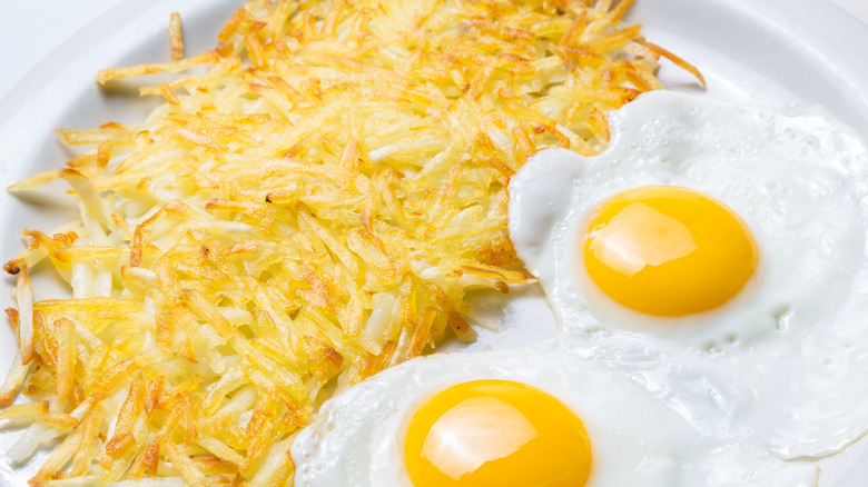 Hash browns served with eggs