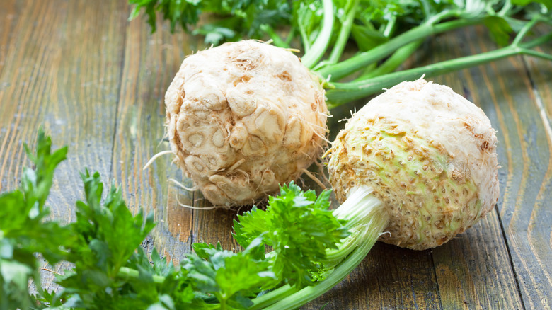 celeriac with leaves on table