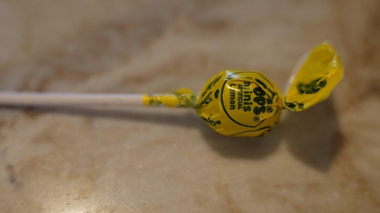 Lemon Tootsie Pop on counter