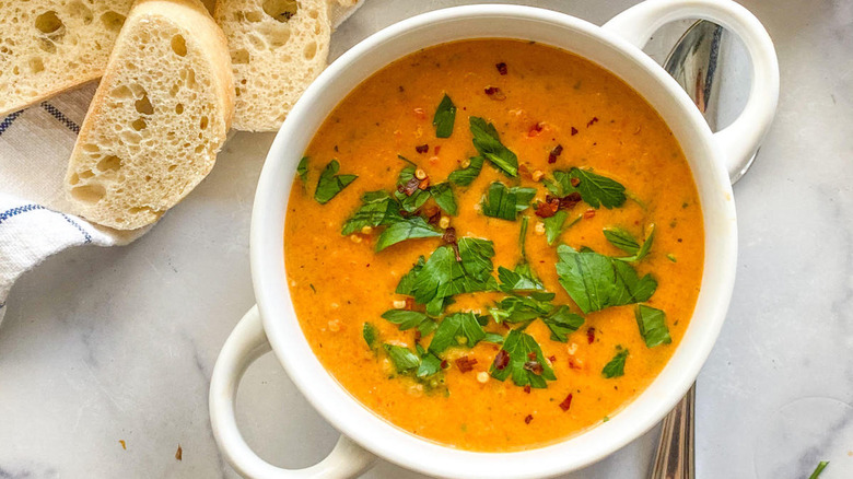 Pepper soup with parsley garnish