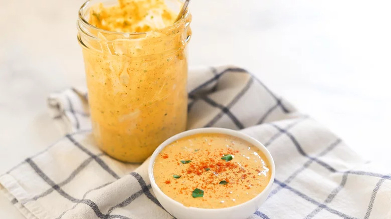 Open jar and small bowl of homemade remoulade