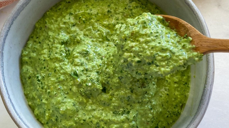 Basil pesto with spoon