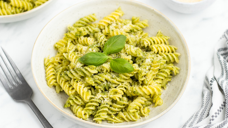 Fusilli pesto pasta in bowl