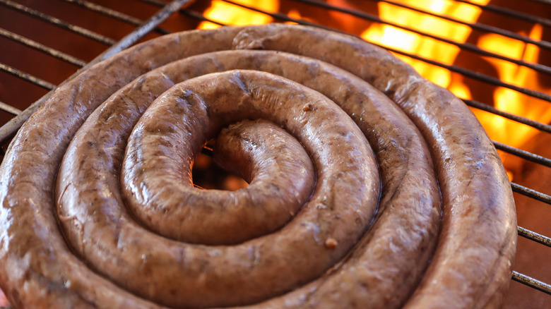 Boerewors on grill with flame