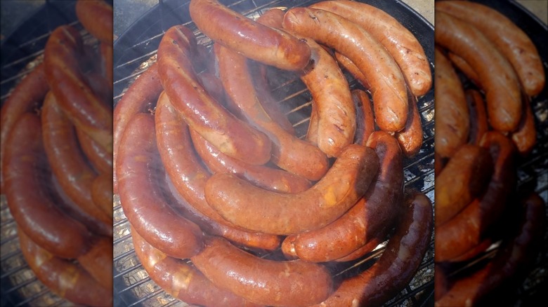 Käsekrainer sausages on grill