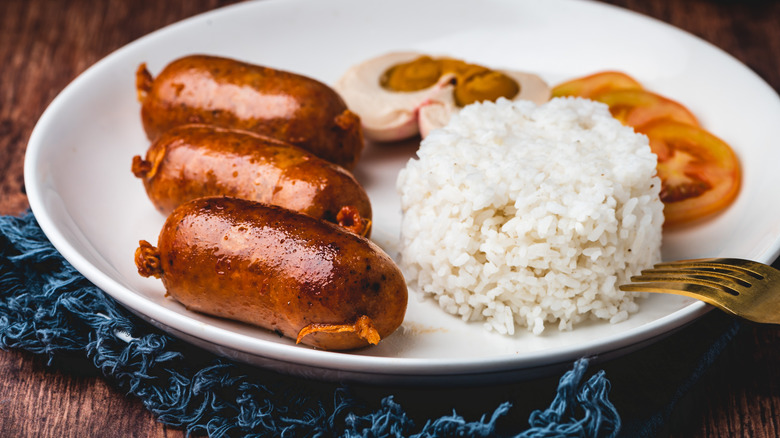 Longganisa on plate with rice