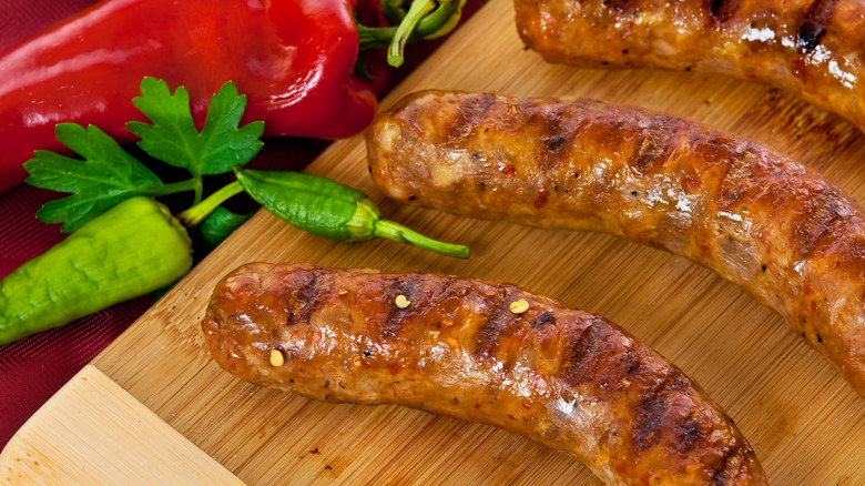 Grilled Italian sausages on board