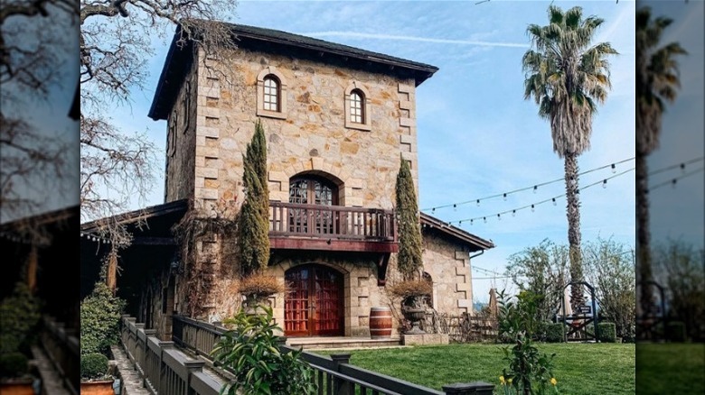 V. Sattui Winery exterior with palm trees